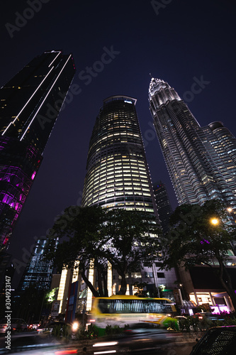 Photography Three skyscrapers night in Kuala Lumpur, Malaysia