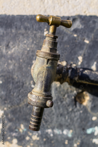 Old Dry Water Tap by the wall 