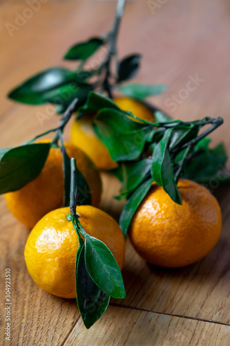 ripe fresh tangerines lie on the table