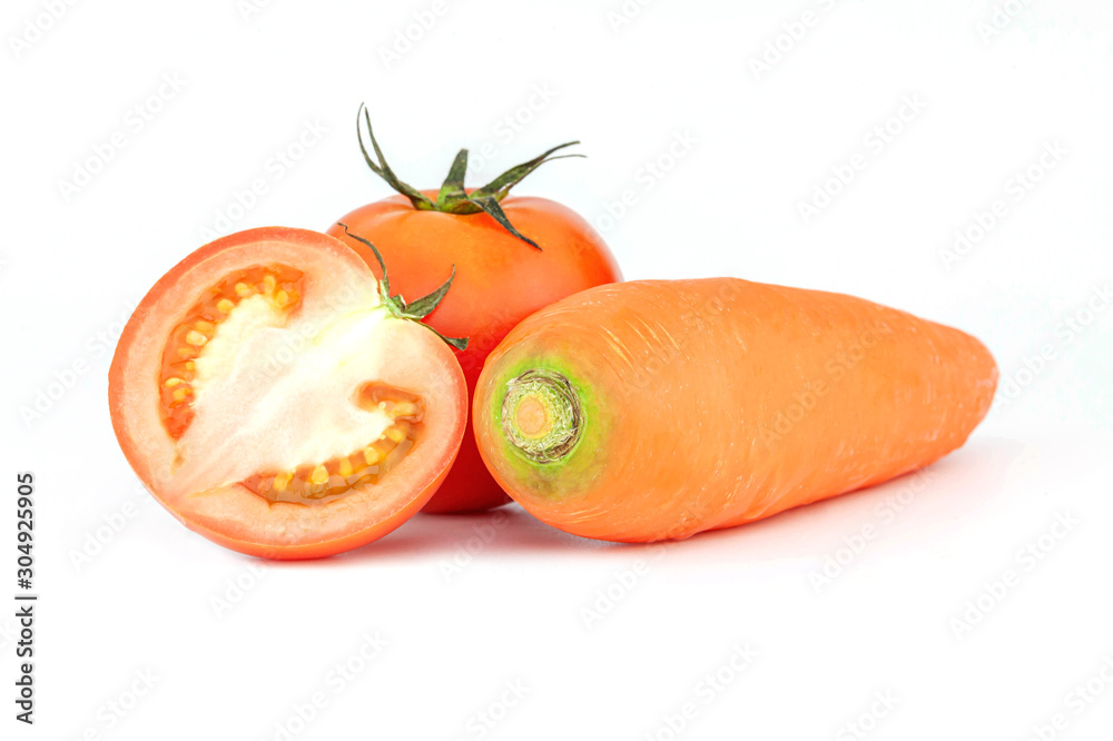 Vegetables tomatoes, carrots fresh collection isolated on a white background Vegetables tomatoes, carrots fresh collection isolated on a white background