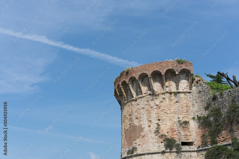 A corner of the castle against blue sky, Italy