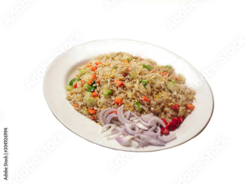 Fried rice with bright colors on a white plate.