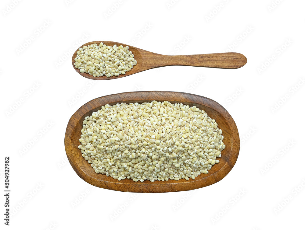 Barley grain seed in wooden bowl and in wooden spoon isolated on white background.Scientific name is Hordeum Vulare. cereal ,top view and close up.Take photo at studio. Barley grain seed in wooden bowl and in wooden spoon isolated on white background.Scientific name is Hordeum Vulare. cereal ,top view and close up.Take photo at studio.
