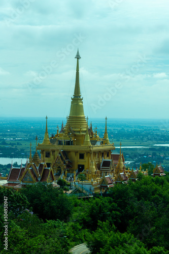  pagoda overlooks the lush woodland and beautiful temples at its foot, the huge golden stupa of Sitagu is surrounded by gardens and forest photo