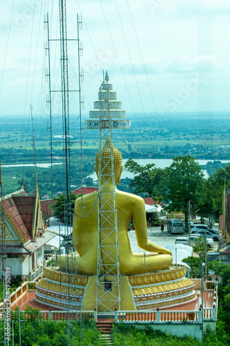  pagoda overlooks the lush woodland and beautiful temples at its foot, the huge golden stupa of Sitagu is surrounded by gardens and forest photo