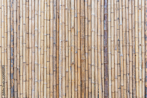 Natural dry grunge bamboo fence background