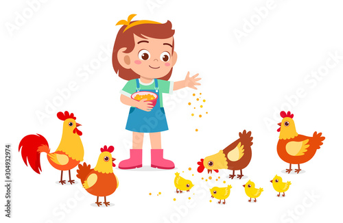 happy cute kid girl feeding cute chicken