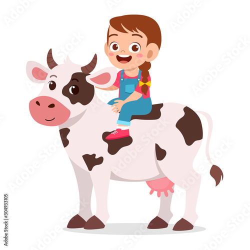 happy cute kid girl riding cute cow