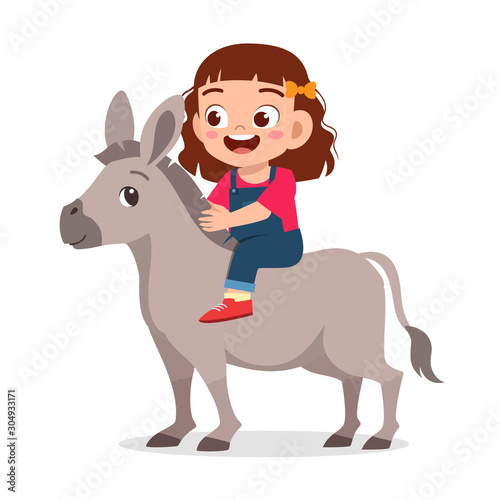 happy cute kid boy riding cute donkey