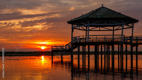 Sunset at the Pavilion on lake or pond or swamp of Bueng See Fai  Phichit  Thailand.