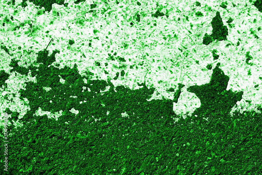 Fototapeta premium Old asphalt surface with white paint close-up, top view. Abstract background. Green color toned