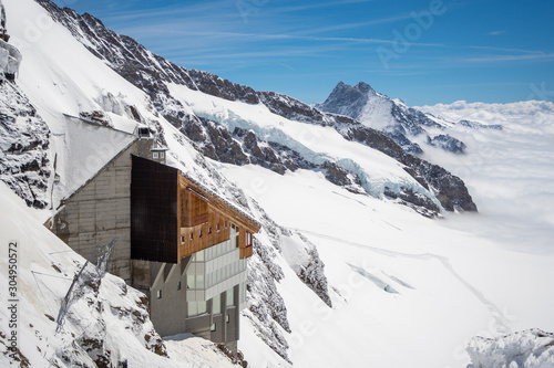 Beautiful view of Sphnix observation deck, snow mountain and Aletsch Glacier on Jungfraujoch , Switzerland photo