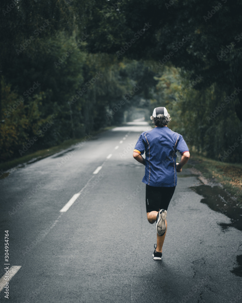man running on country road man running on country road