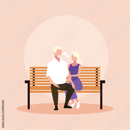 couple of people in love sitting in the park chair