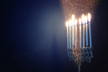 Religion image of jewish holiday Hanukkah background with menorah (traditional candelabra) and candles