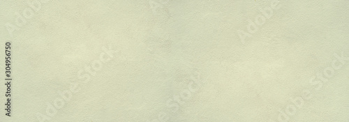 surface of cream color cement wall for the design texture background