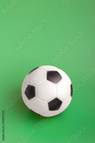 Globe and soccer ball on white background. December 10  World Football Day