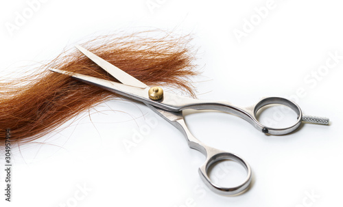 scissors with a lock of hair