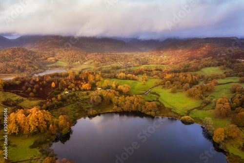 Beautiful vibrant aerial drone landscape image of sunrise in Autumn Fall over English countryside © veneratio