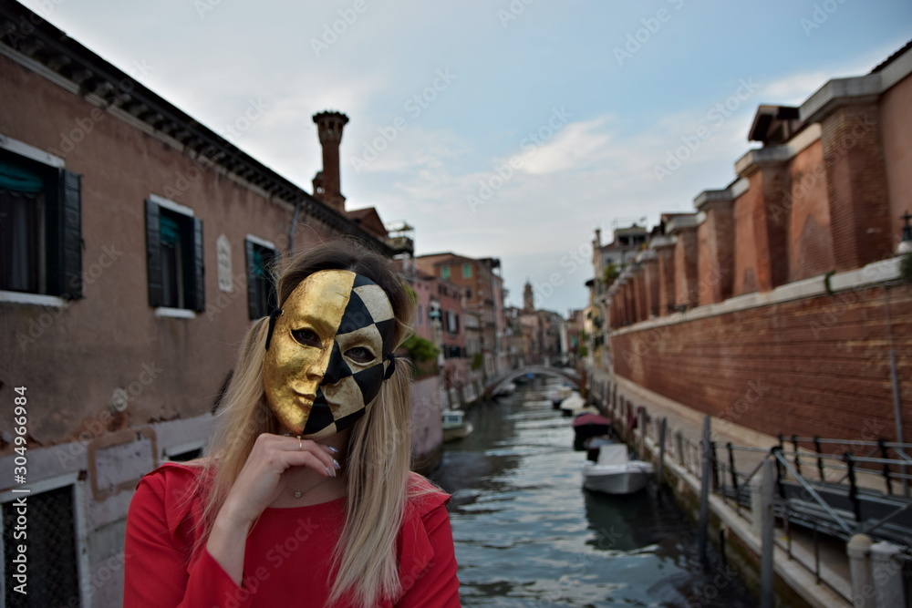 Woman in mask in venice