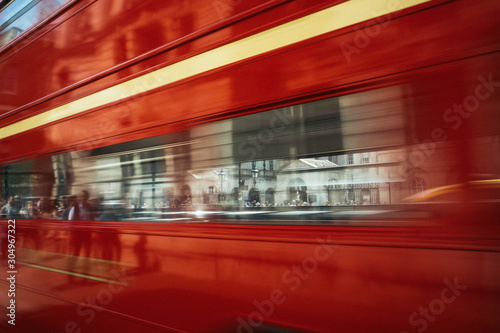 Old Red Routemaster Bus long exposure as it goes down Whitehall, London
