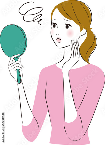 手鏡を見る女性