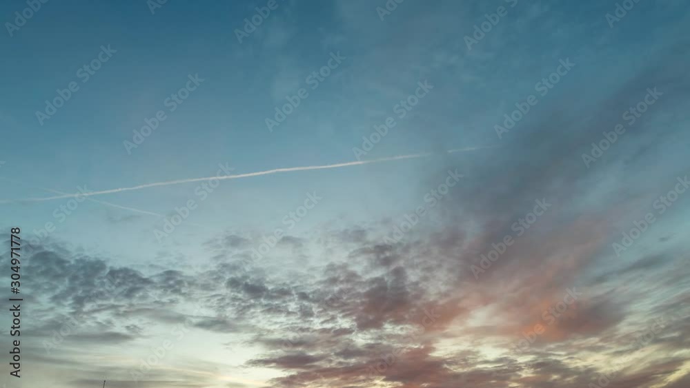 Sunrise timelapse of the sky with beautiful moving clouds. Sunrise sky with beautiful pink, yellow, blue, orange clouds Sunrise timelapse of the sky with beautiful moving clouds. Sunrise sky with beautiful pink, yellow, blue, orange clouds