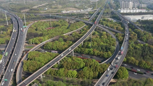 Aerial Video of car traffic and huge elevated road circle multilevel complex, car transportation scene in Shanghai, China in 4K UHD 