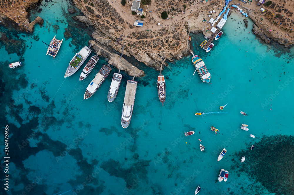 Aerial drone shot of Blue lagoon Gozo Malta Comino island. Best beaches of Mediterranean - obrazy, fototapety, plakaty 