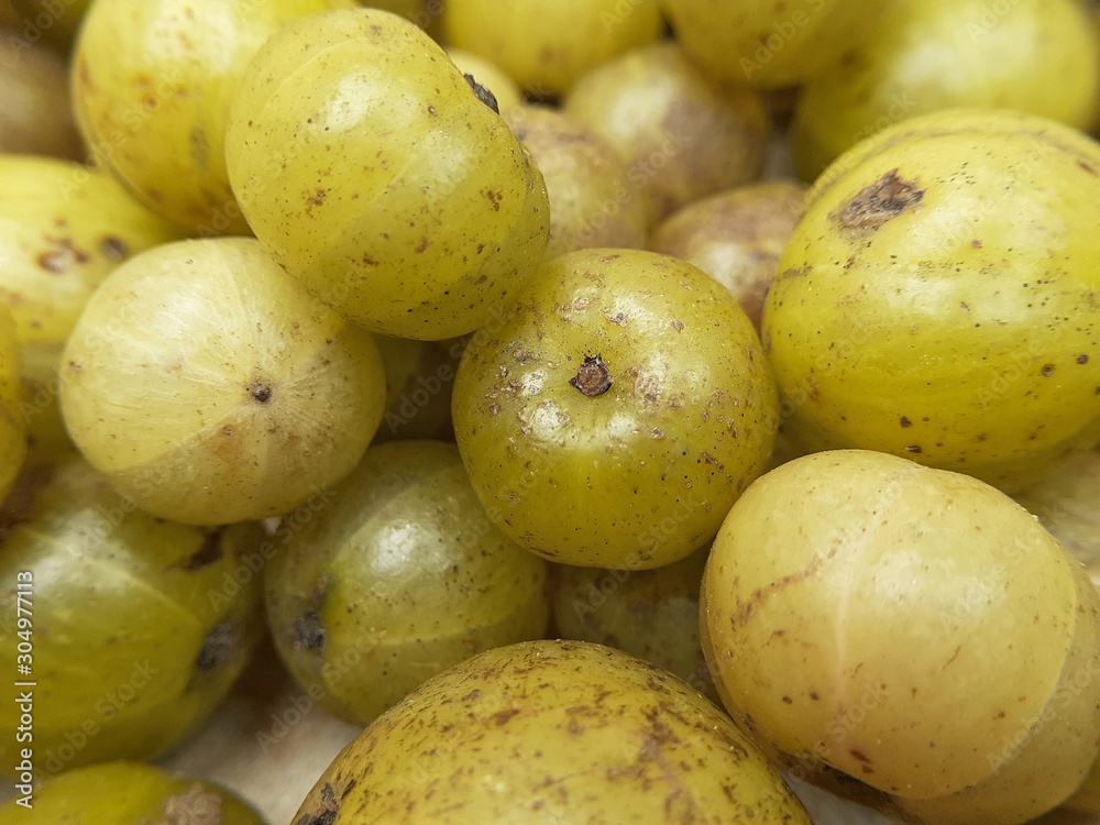 Amla or phyllanthus emblica. Closeup image of Indian gooseberry. Amla or phyllanthus emblica. Closeup image of Indian gooseberry.