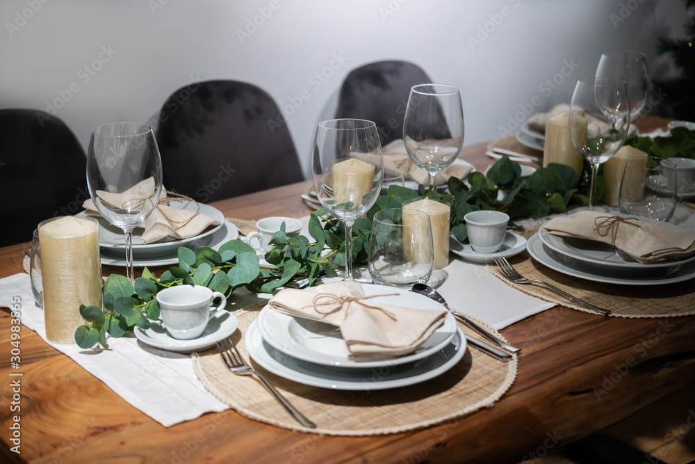 Fototapeta premium Table served for Christmas dinner in living room.