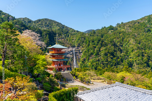 Beautiful famous landmark waterfall Nachi Falls in green forest blue sky Nachikatsuura Wakayama Prefecture Japan Nachi Fall is one of the best waterfalls  in Japan idea for rest relax enjoy lifestyle photo