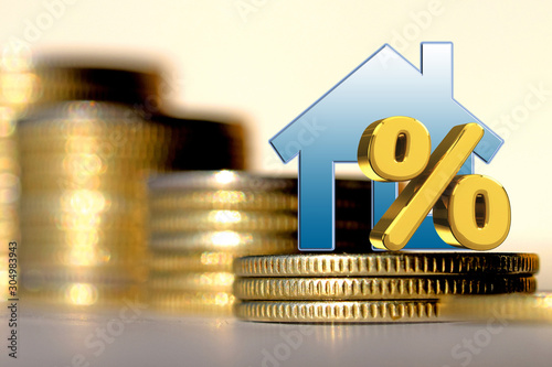 	The percent symbol and real estate on a background of money . The concept of price changes on the real estate market .