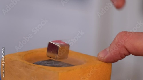 Superconductor and nitrogen - experience with liquid nitrogen cooling and magnet levitation. Quantum levitation. 4k footage.