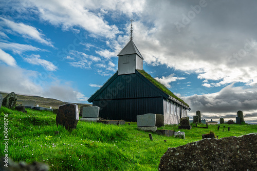 Church of Kaldbak (Kaldbak Kirkja) and graveyard in Streymoy island, Faroe Islands photo