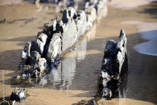 Rock formations at Praia da Arrifana (Arrifana Beach), Alentejo, Algarve; Portugal