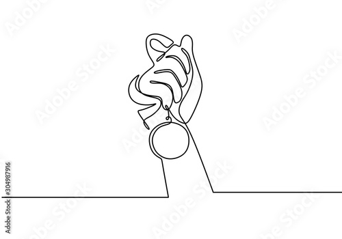 one line hand holding medal of winner symbol. Award and reward continuous hand drawn sketch vector illustration with simplicity design.