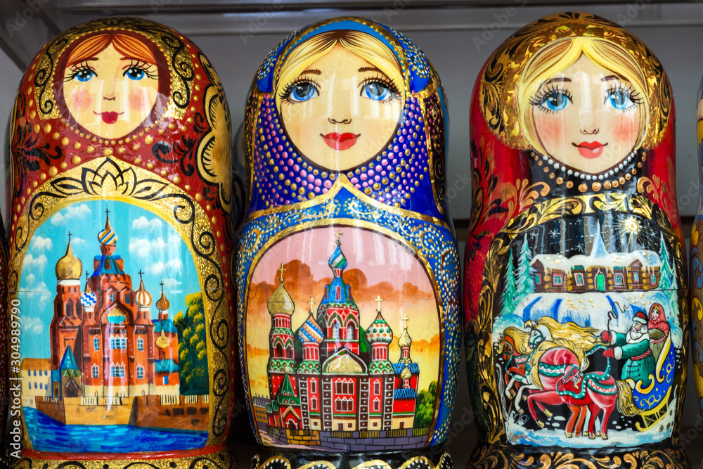 Wooden Nesting Dolls or Russian Matryoshka Dolls in the street market in Russia nesting dolls traditional Russian souvenirs for tourists Photos Adobe Stock