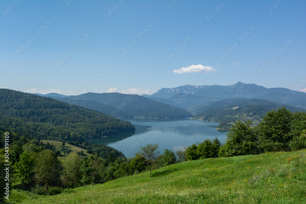 View of Lake Bicaz with Ceahlau Massif on the background, Romania