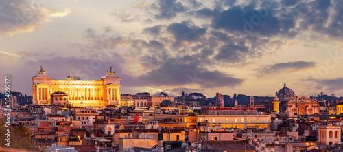 Panoramic view aerial city Rome from square of Venice rooftop sunset