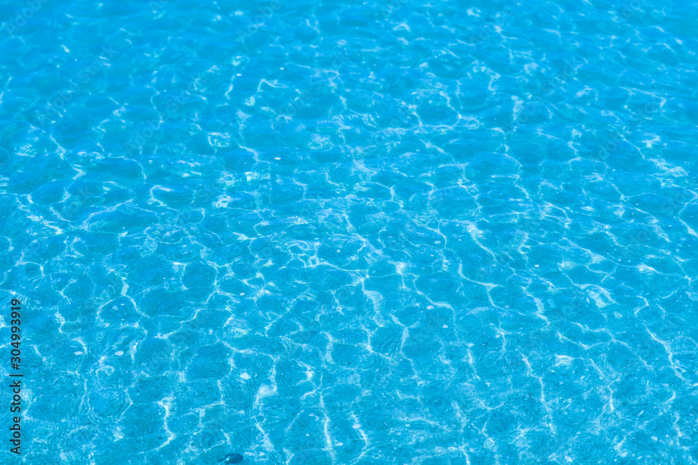 The water is so clear that you can see the sand and shells in the water