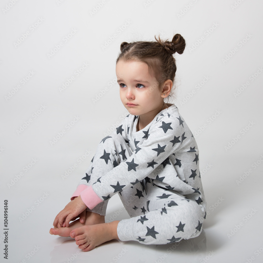 Crying little girl. Upset kid. Sad kid portrait. Cute little gilr crying and does not want to go in bed at night Crying little girl. Upset kid. Sad kid portrait. Cute little gilr crying and does not want to go in bed at night