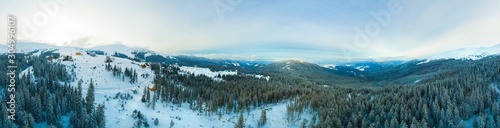 Fototapeta Naklejka Na Ścianę i Meble -  Aerial view of the evening winter panorama