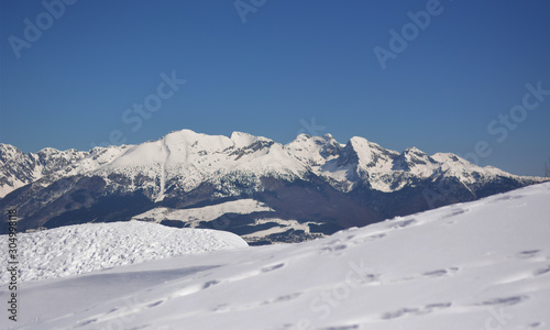 the snow in the mountains of Belluno © corradobarattaphotos
