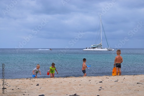 children playing on the beach