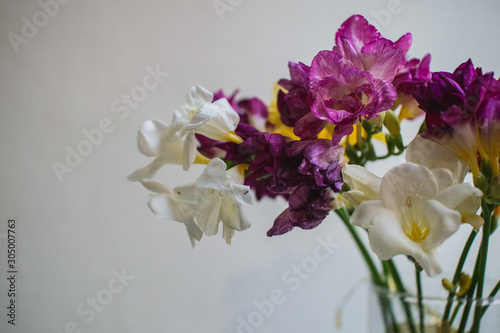 beautiful multi-colored alstroemeria bouquet in a glass vase