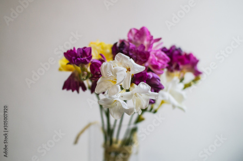 Wallpaper Mural beautiful multi-colored alstroemeria bouquet in a glass vase Torontodigital.ca