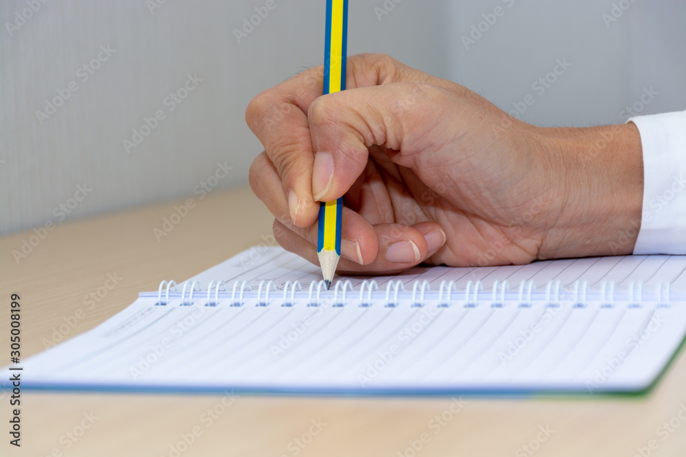 Use a pencil to write a notebook Use a pencil to write a notebook