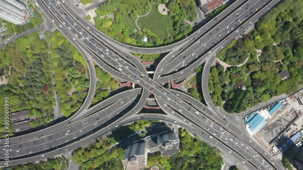 Aerial Video of car traffic and huge elevated road circle multilevel complex, car transportation scene in Shanghai, China in 4K UHD Aerial Video of car traffic and huge elevated road circle multilevel complex, car transportation scene in Shanghai, China in 4K UHD