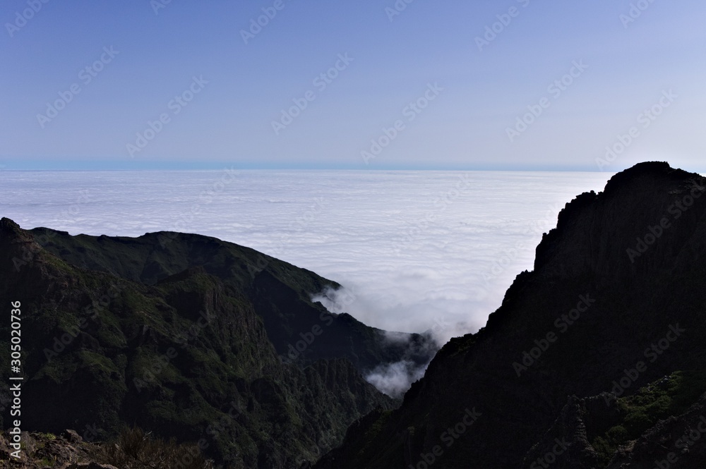 Panoramic view above clouds on a mountain peak (Madeira, Portugal, Europe)
